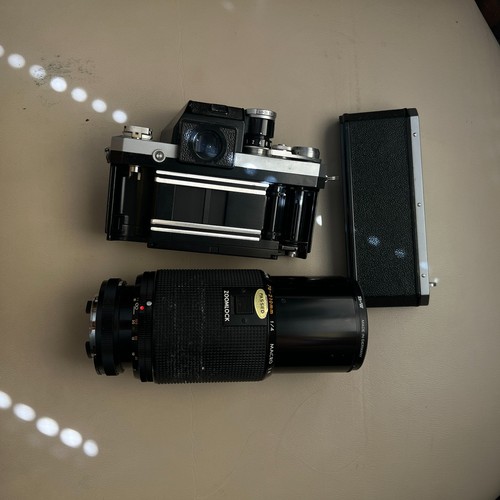 Nikon 210mm f - &,